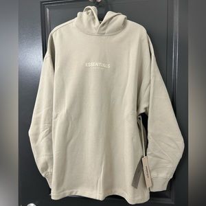 Fear of God essentials beige relaxed hoodie